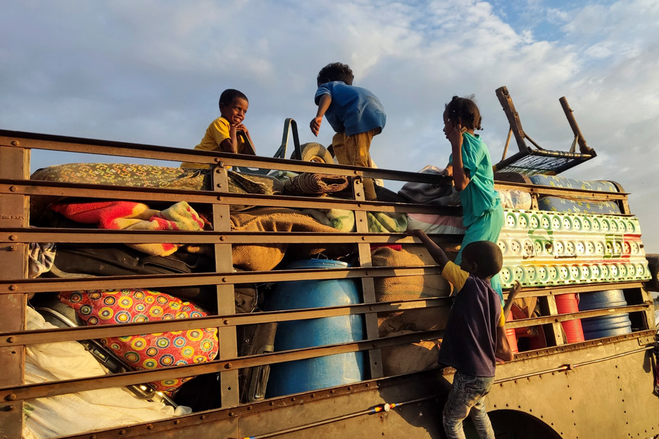 Kinder auf dem Lastwagen / Foto: AFP