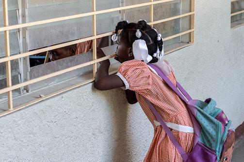 „Ich bei meiner Schule. Wo ich herkam, da gab es keine Schule. Hier habe ich mich auf den Unterricht gefreut.“